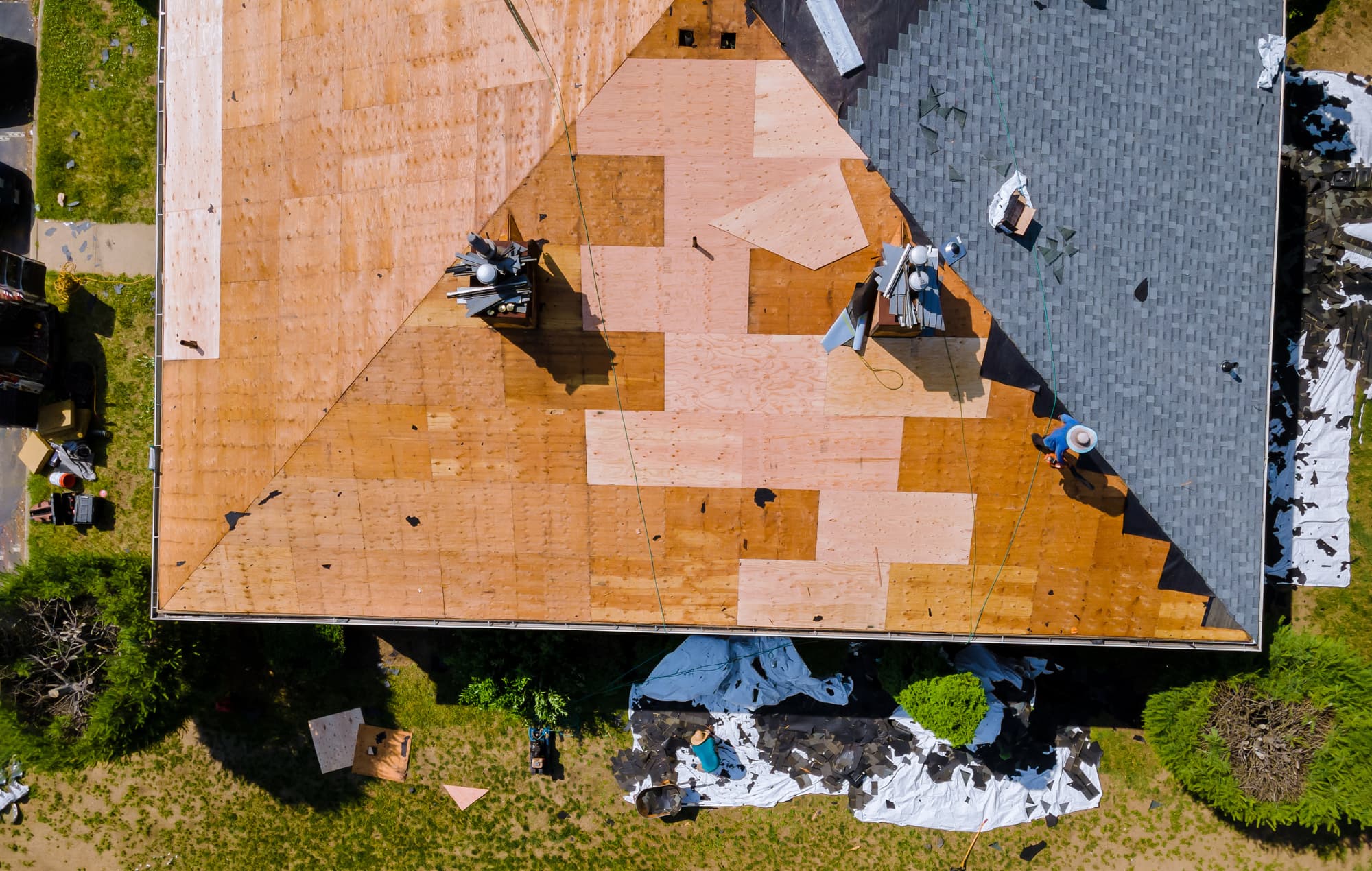 Removal of old roof replacement with new shingles